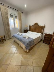 A bed or beds in a room at Casa Gonzalez