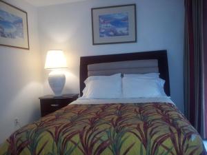 Ένα ή περισσότερα κρεβάτια σε δωμάτιο στο Shores Terrace