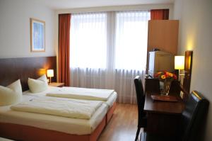 Cama ou camas em um quarto em Hotel Italia