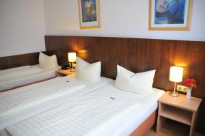Cama ou camas em um quarto em Hotel Italia