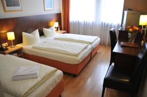 Cama ou camas em um quarto em Hotel Italia
