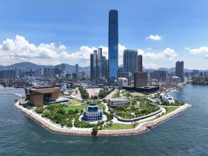 an island in the water with a city in the background at InterContinental Grand Stanford Hong Kong, an IHG Hotel in Hong Kong