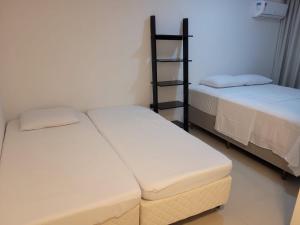 Cama o camas de una habitación en Apartamento Rota do Mar