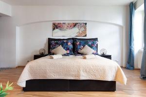 Postel nebo postele na pokoji v ubytování Smyrna Boutique Apartments
