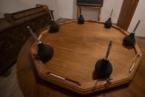 a wooden table with four spoons on top of it at La Ferme des 3 lacs in Xonrupt-Longemer