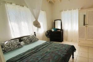 Llit o llits en una habitació de StarFish Apartment
