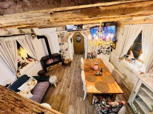 an overhead view of a living room with a wooden table at Kuća za odmor Čarolija in Jastrebarsko