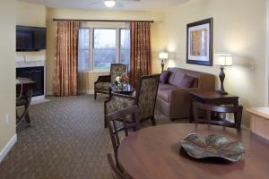 a living room with a couch and a table at Holiday Inn Club Vacations at Lake Geneva Resort, an IHG Hotel in Lake Geneva