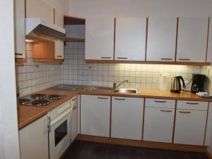 Kuchyň nebo kuchyňský kout v ubytování Nice apartment in Samnaun with garden