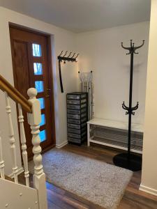 a room with a stairway with a door and a room with at Myrarkot Country Home in Selfoss