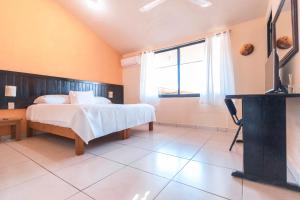 Ένα ή περισσότερα κρεβάτια σε δωμάτιο στο Stunning Duplex near the beach