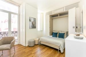 Postel nebo postele na pokoji v ubytování Alcântara by SpotOn Apartments