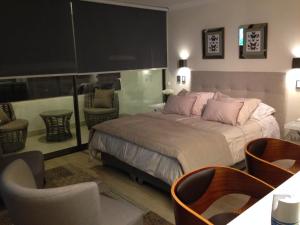 Cama o camas de una habitación en Apartamento Avenida Kennedy