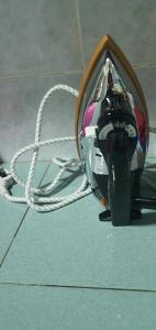 a close up of a snowboardership with a rope at UIA Younee Kuantan Homestay 3R2B 9pax 5 min to town in Kuantan +25 photos