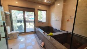 Imagem da galeria de Wulai Shui An Hot Springs em Wulai