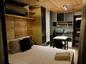 Postel nebo postele na pokoji v ubytování Moriá Village