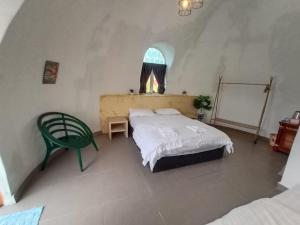 Postel nebo postele na pokoji v ubytování Monkey Mier LOT 2028