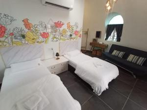 Postel nebo postele na pokoji v ubytování Monkey Mier LOT 2028
