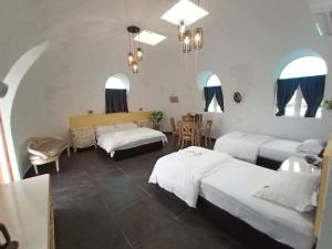 Postel nebo postele na pokoji v ubytování Monkey Mier LOT 2028