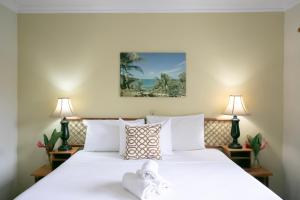 Llit o llits en una habitació de Gran Hotel Bahia