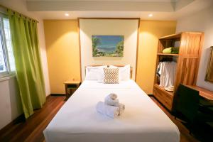 Una cama o camas en una habitación de Gran Hotel Bahia