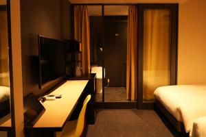 TV a/nebo společenská místnost v ubytování Nplus HOTEL Higashikanda-akihabara