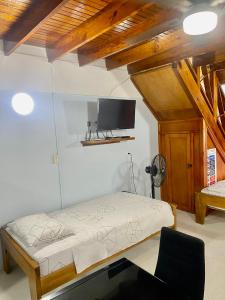 Postel nebo postele na pokoji v ubytování Cabaña Diana