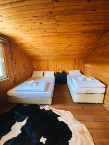 Llit o llits en una habitació de Zeni Konağı