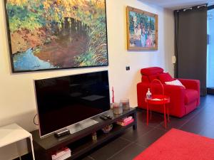 A television and/or entertainment centre at L’ARTSHOP