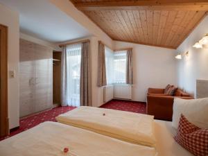 Posteľ alebo postele v izbe v ubytovaní Landhaus Alpina