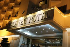 a hotel sign on the front of a building at Hotel Hillview Islamabad in Islamabad