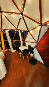 Posezení v ubytování Oasis Glamping Tena Cun Vía La Mesa Anapoima