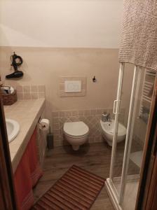 Kúpeľňa v ubytovaní Arvé Castelbianco - B&B e Appartamento