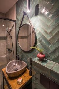 a bathroom with a sink and a mirror at Rezerwat Ustrzyki Górne in Ustrzyki Górne