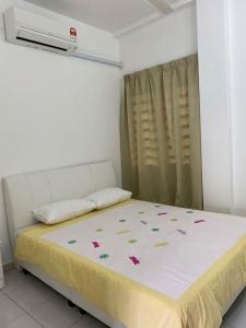 Postel nebo postele na pokoji v ubytování 15 min to Qing Xin Ling Cultural Village Ipoh