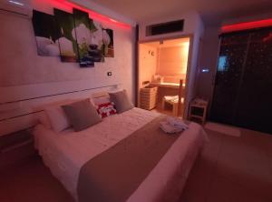 Llit o llits en una habitació de B&B suite spa la Sciantosa 9 fotos més