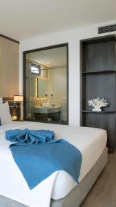 Postel nebo postele na pokoji v ubytování Seana Hotel
