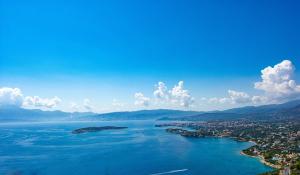 an aerial view of a river and a city at Majestic View Villas in Agios Nikolaos