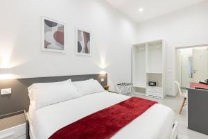 A bed or beds in a room at La Torre 31