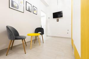 A television and/or entertainment centre at La Torre 31