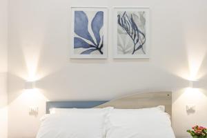 A bed or beds in a room at La Torre 31