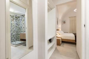 A bed or beds in a room at La Torre 31