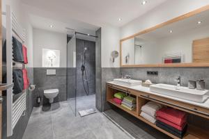 Łazienka w obiekcie Apartment NH96 inklusive kostenfreiem Eintritt in die Alpentherme