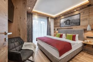 Łóżko lub łóżka w pokoju w obiekcie Apartment NH96 inklusive kostenfreiem Eintritt in die Alpentherme