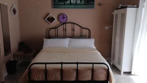 Llit o llits en una habitació de La Maestranza Apartment Rooms