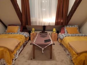 Un pat sau paturi într-o cameră la Sibirska Central