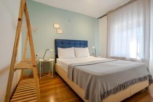 Postel nebo postele na pokoji v ubytování Colorful Flat in Beyoglu with Excellent Location