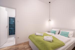 Posteľ alebo postele v izbe v ubytovaní Delta Curve Apartment