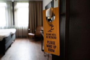 Postel nebo postele na pokoji v ubytování Veluwe Hotel De Beyaerd
