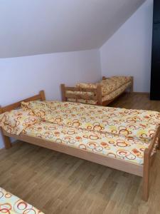 Postel nebo postele na pokoji v ubytování Vila Lane